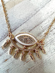 GOLDEN EYE NECKLACE
